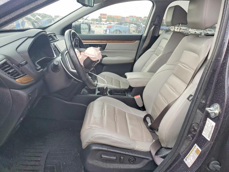 Photo 7 from auction – 2018 HONDA CR-V with VIN 7FARW2H93JE092474
