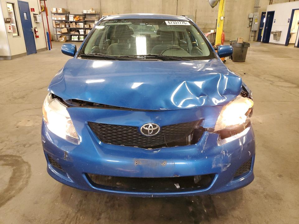 Photo 5 from auction – 2009 TOYOTA COROLLA with VIN 1NXBU40EX9Z113116