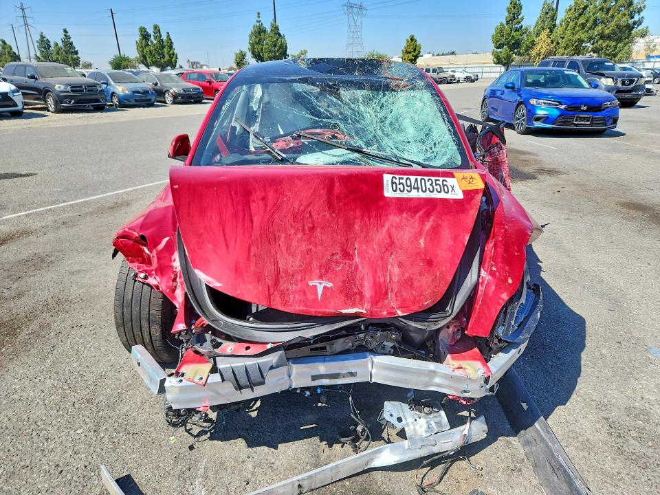 Photo 5 from auction – 2022 TESLA MODEL 3 with VIN 5YJ3E1EAXNF361010