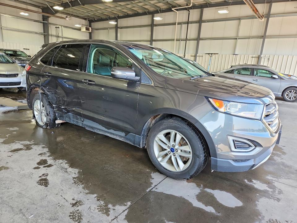 Photo 4 from auction – 2016 FORD EDGE with VIN 2FMPK4J98GBC61829