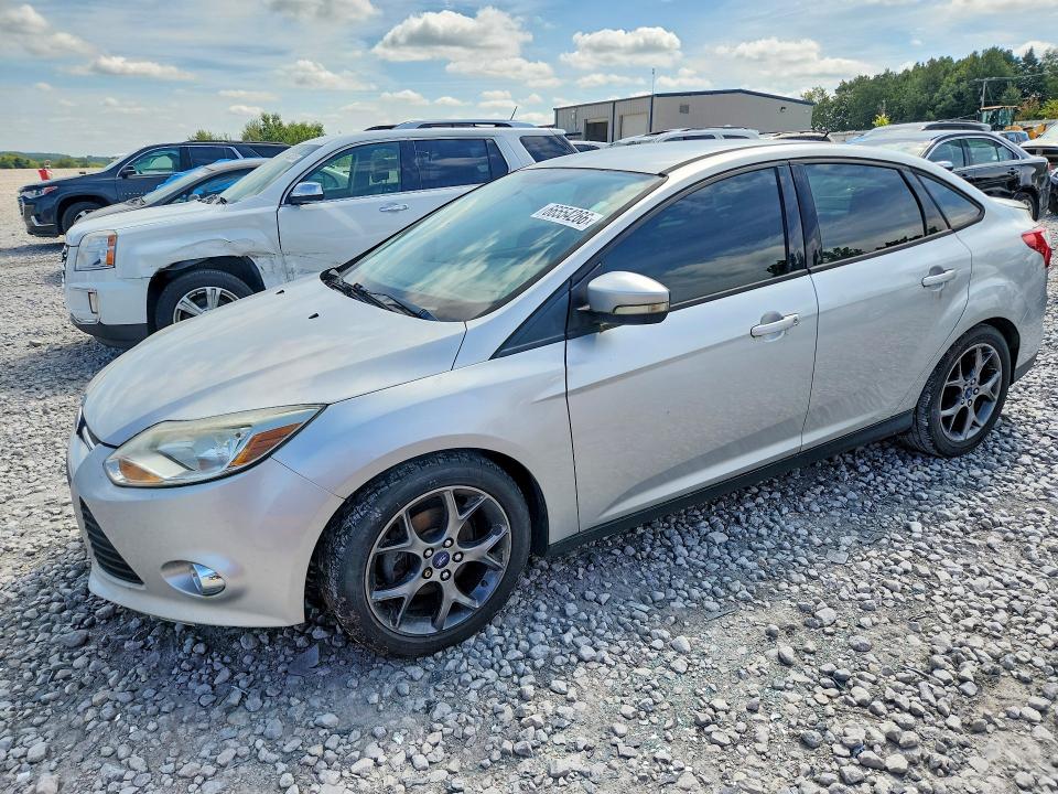 FORD FOCUS 2014 with VIN 1FADP3F29EL107454 - Photo from auction