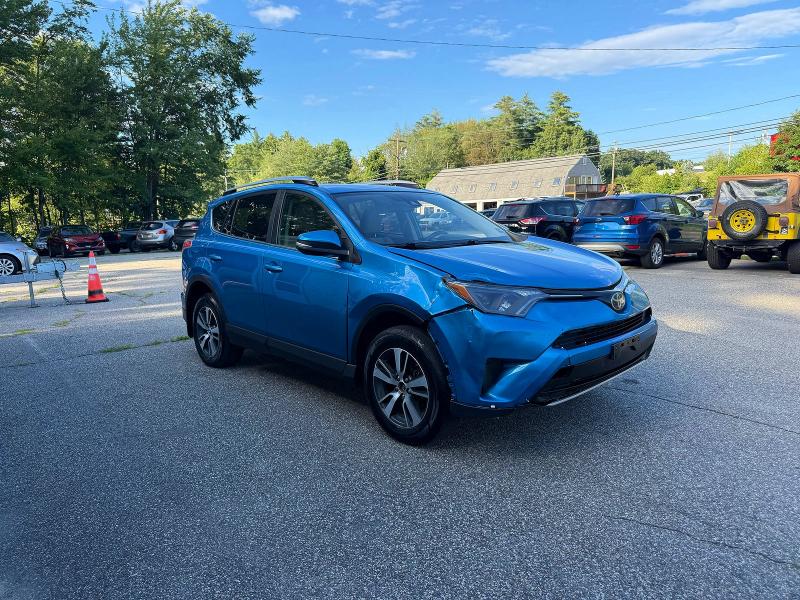 TOYOTA RAV4 2017 with VIN JTMRFREV2HJ168047 - Photo from auction