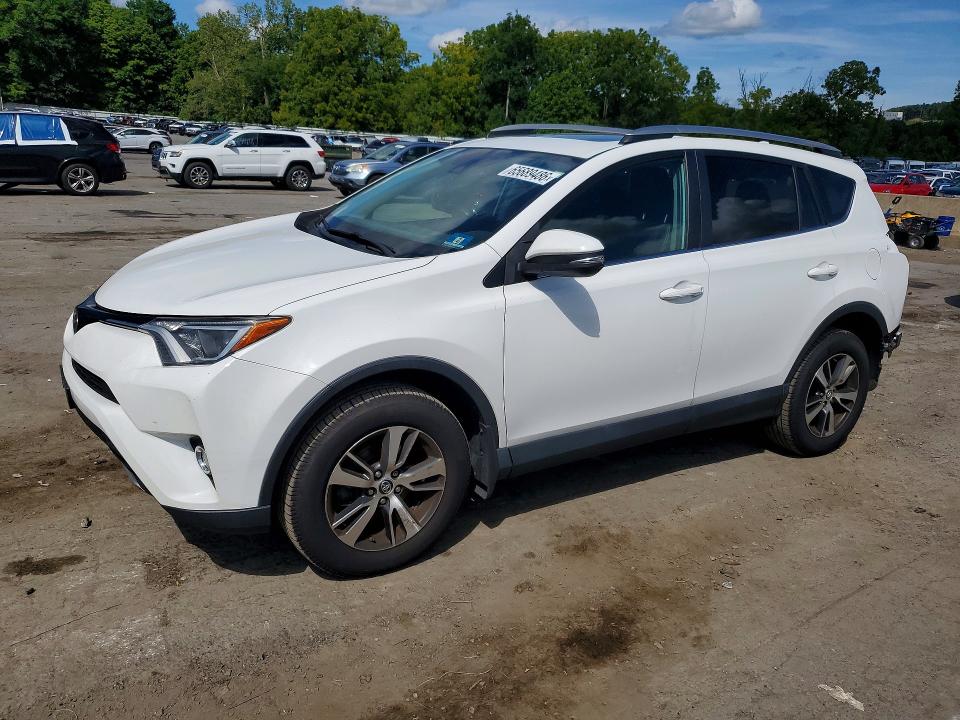 TOYOTA RAV4 2018 with VIN 2T3RFREV8JW744523 - Photo from auction