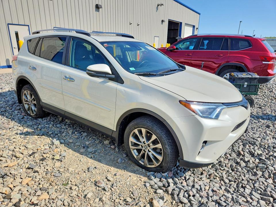Photo 4 from auction – 2016 TOYOTA RAV4 with VIN JTMDFREV1GD176616
