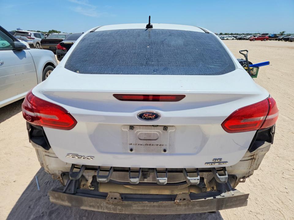 Photo 6 from auction – 2016 FORD FOCUS with VIN 1FADP3F23GL351118