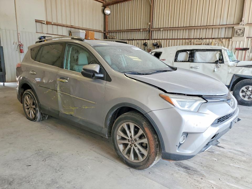 Photo 4 from auction – 2018 TOYOTA RAV4 with VIN 2T3DFREV3JW724450