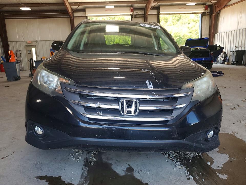 Photo 5 from auction – 2014 HONDA CR-V with VIN 2HKRM4H73EH660029