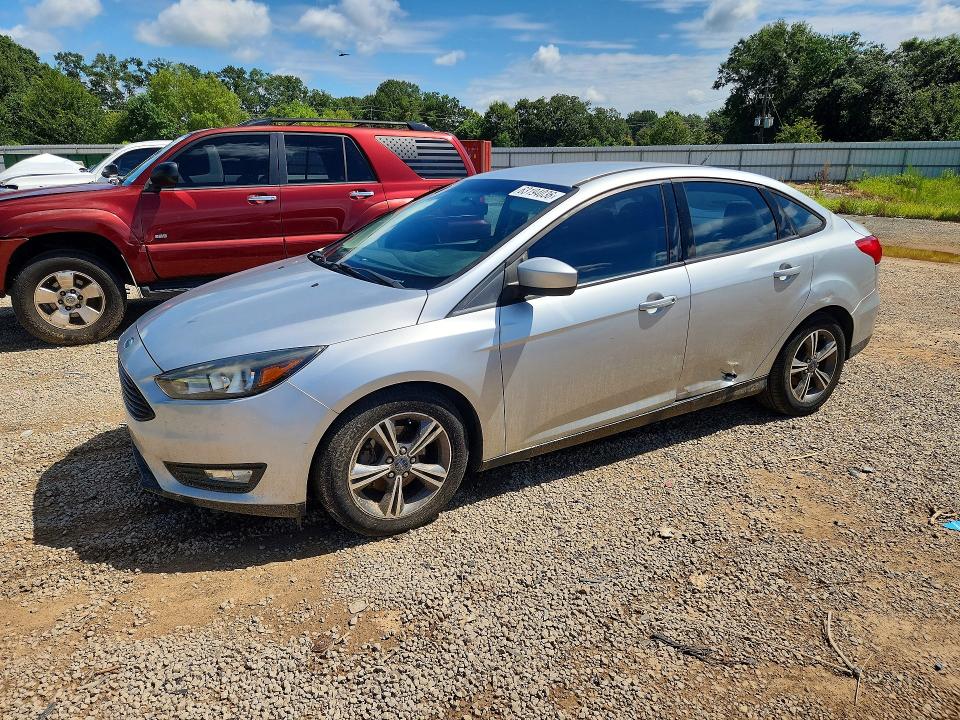 FORD FOCUS 2018 with VIN 1FADP3FE7JL255932 - Photo from auction
