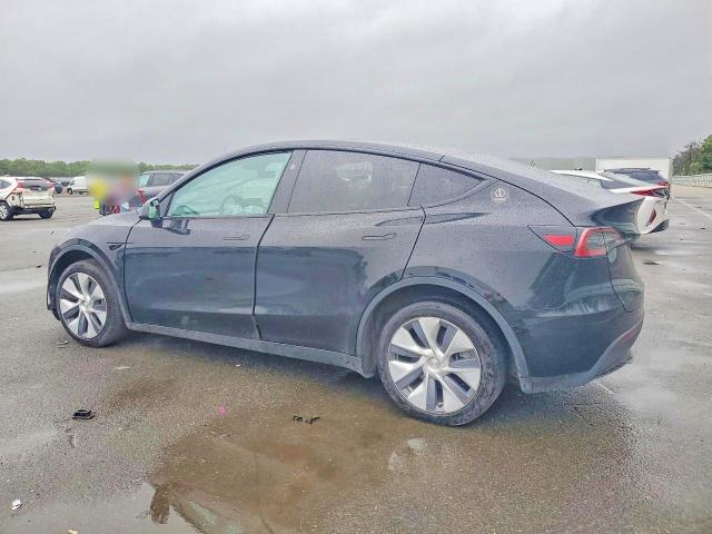 Photo 2 from auction – 2023 TESLA MODEL Y with VIN 7SAYGDEE4PA180458