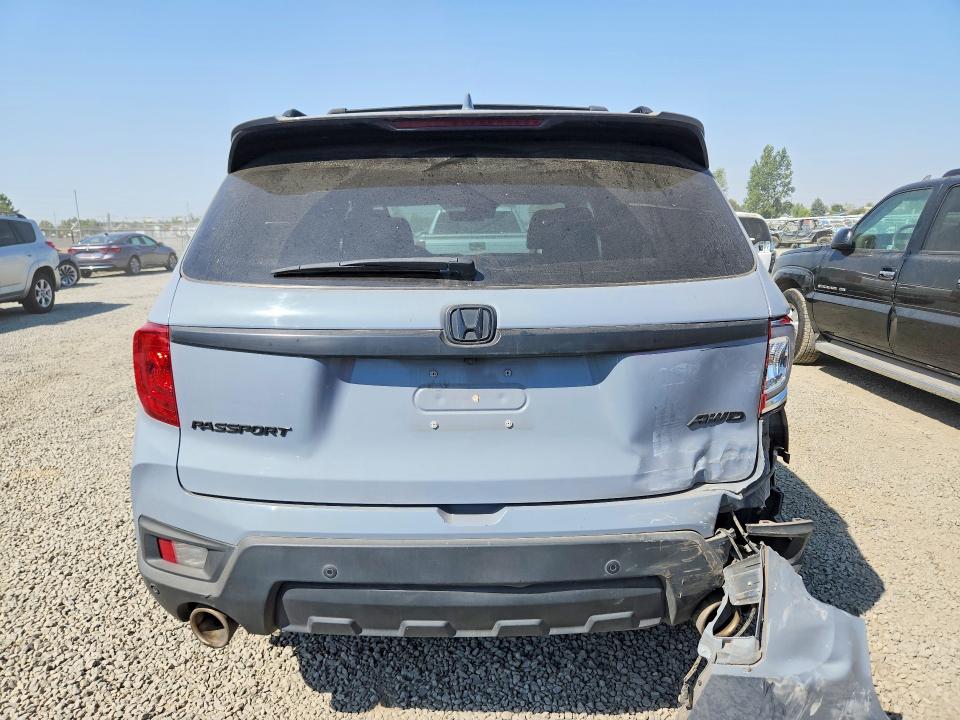 Photo 6 from auction – 2023 HONDA PASSPORT with VIN 5FNYF8H58PB038569