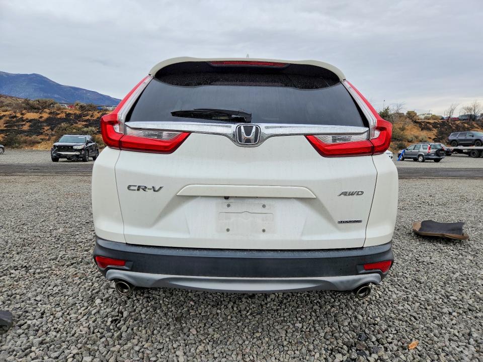Photo 6 from auction – 2018 HONDA CR-V with VIN 2HKRW2H96JH665199