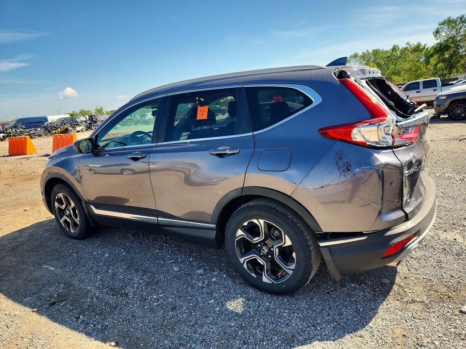 Photo 2 from auction – 2018 HONDA CR-V with VIN 7FARW2H93JE061807