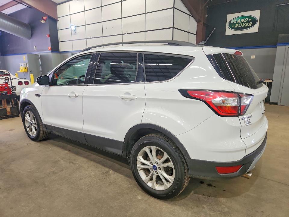 Photo 2 from auction – 2018 FORD ESCAPE with VIN 1FMCU9GD7JUA26406