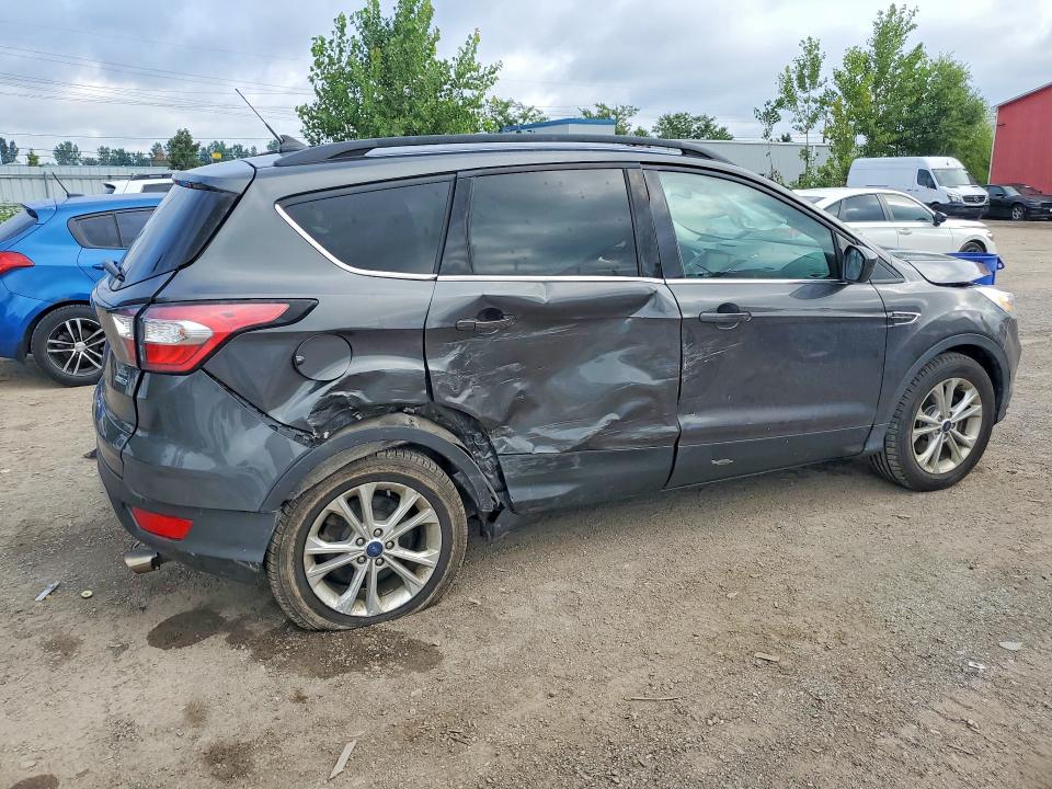 Foto 3 de la subasta – 2018 FORD ESCAPE con VIN 1FMCU9HD5JUB62936