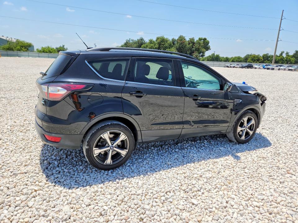 Photo 3 from auction – 2017 FORD ESCAPE with VIN 1FMCU0G94HUC60083