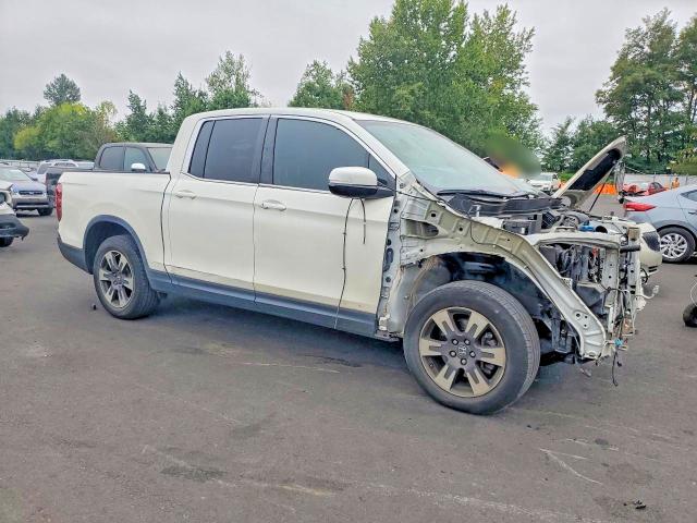 Photo 4 from auction – 2017 HONDA RIDGELINE with VIN 5FPYK2F55HB007235