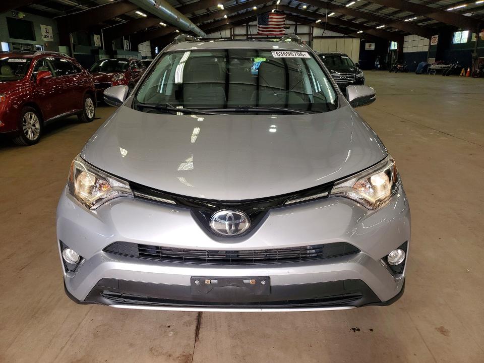 Photo 5 from auction – 2018 TOYOTA RAV4 with VIN 2T3RFREV3JW796397