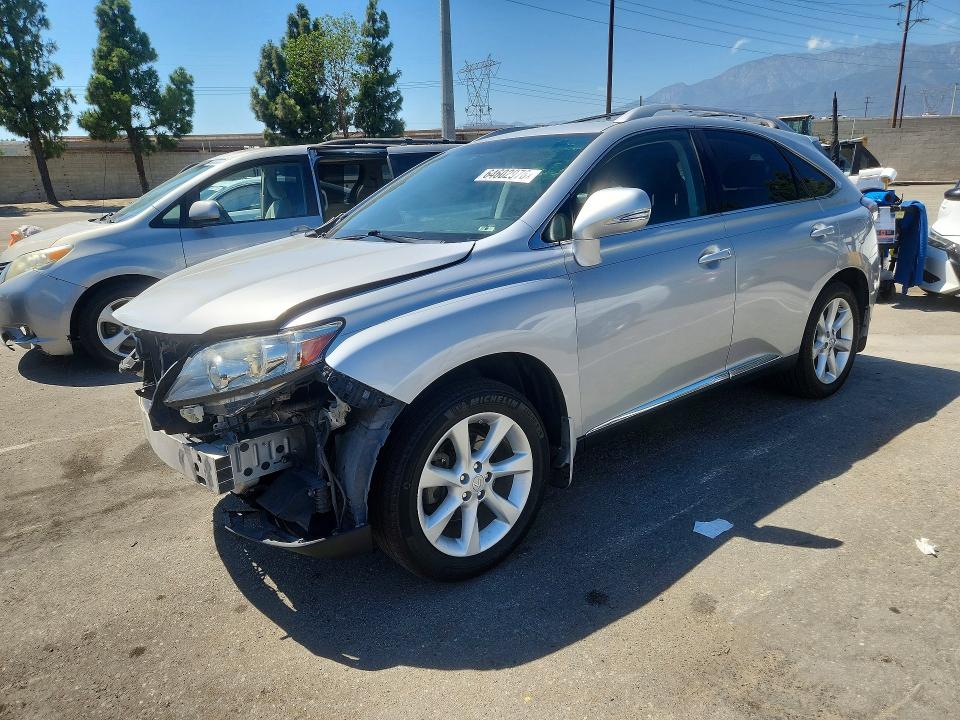 LEXUS RX 2011 with VIN JTJBK1BAXB2433067 - Photo from auction