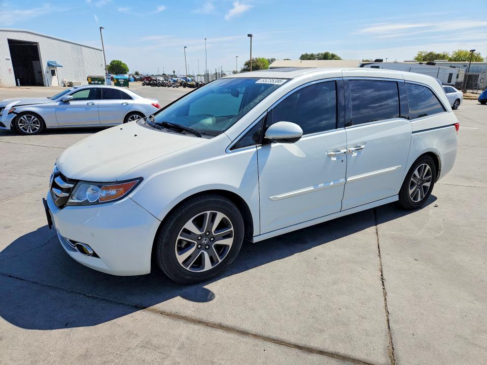 HONDA ODYSSEY 2014 with VIN 5FNRL5H90EB058262 - Photo from auction