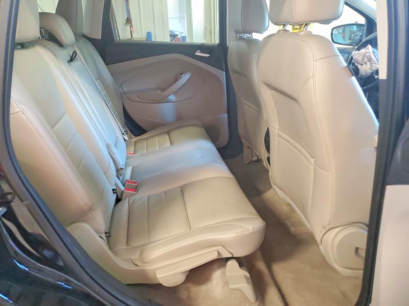 Photo 11 from auction – 2016 FORD ESCAPE with VIN 1FMCU9GX7GUC43621