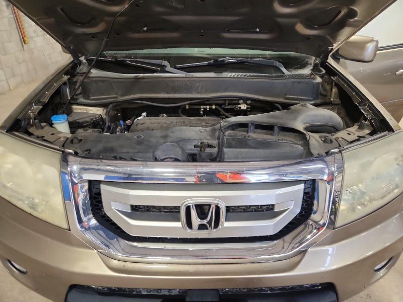 Photo 12 from auction – 2011 HONDA PILOT with VIN 5FNYF4H53BB072808