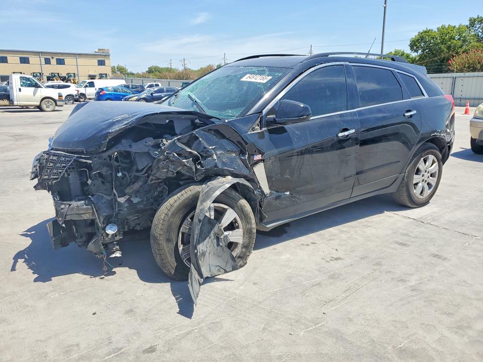 CADILLAC SRX 2014 with VIN 3GYFNAE35ES677852 - Photo from auction