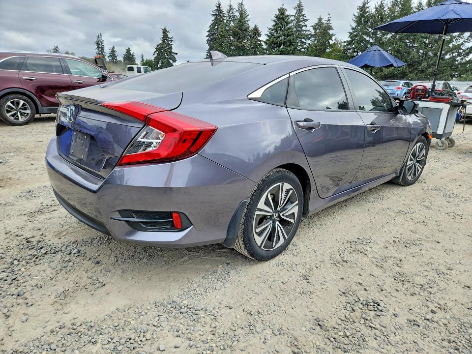 Photo 3 from auction – 2016 HONDA CIVIC with VIN 2HGFC1F31GH655025