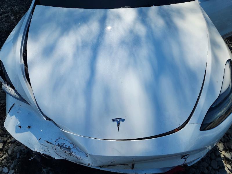 Photo 11 from auction – 2023 TESLA MODEL Y with VIN 7SAYGDEE9PF683342