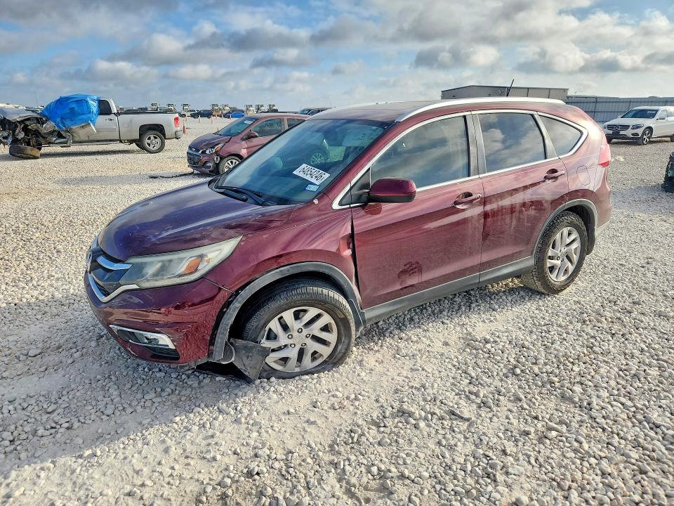 HONDA CR-V 2015 with VIN 2HKRM3H75FH520656 - Photo from auction