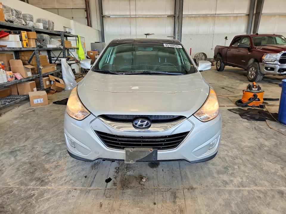Photo 5 from auction – 2011 HYUNDAI TUCSON with VIN KM8JUCAC3BU226172