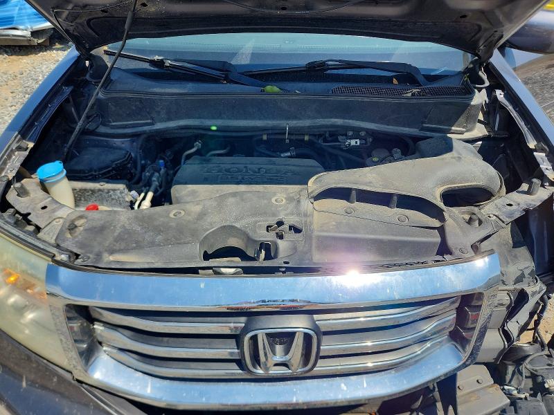 Photo 11 from auction – 2014 HONDA PILOT with VIN 5FNYF4H61EB012720