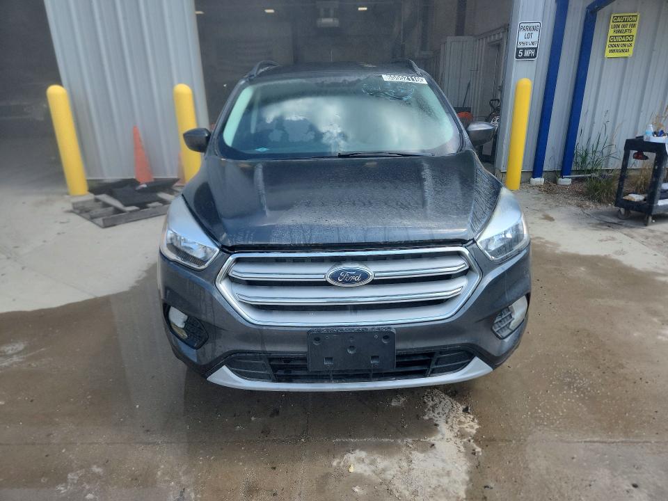 Photo 5 from auction – 2018 FORD ESCAPE with VIN 1FMCU9GD7JUC28744