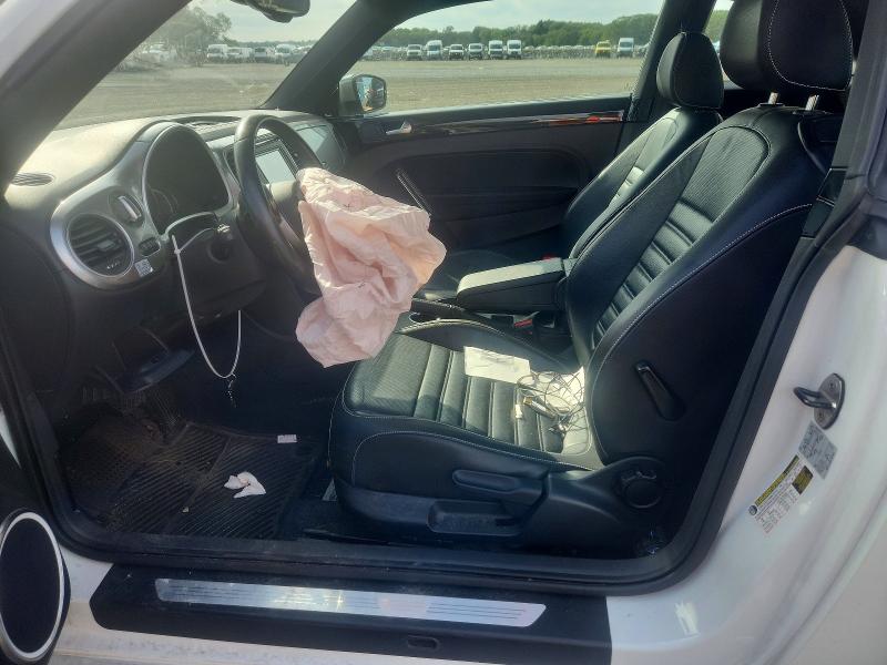 Photo 7 from auction – 2014 VOLKSWAGEN BEETLE with VIN 3VWJL7AT8EM653397