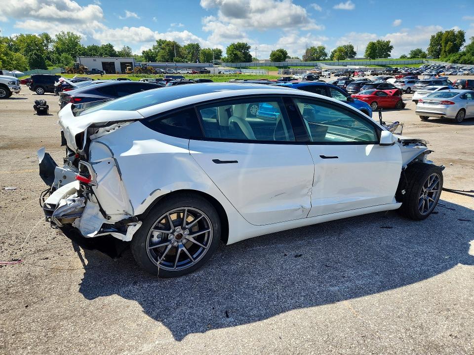 Photo 3 from auction – 2022 TESLA MODEL 3 AW with VIN 5YJ3E1EB0NF349165