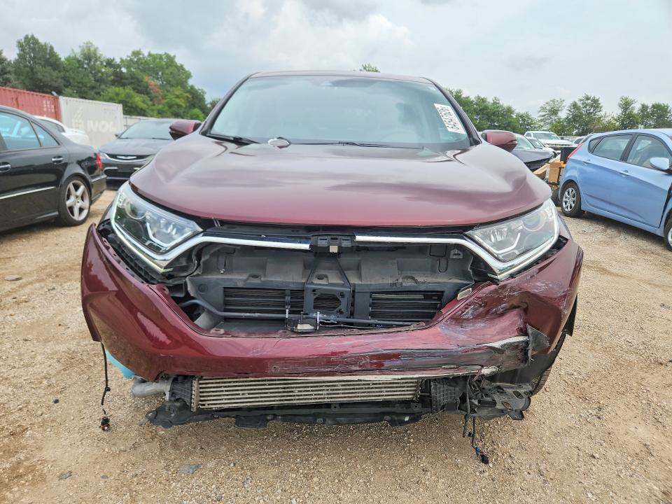 Photo 5 from auction – 2018 HONDA CR-V with VIN 7FARW2H59JE085865