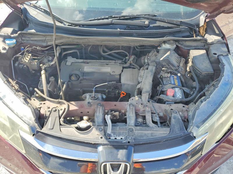 Photo 11 from auction – 2015 HONDA CR-V with VIN 2HKRM4H77FH606038