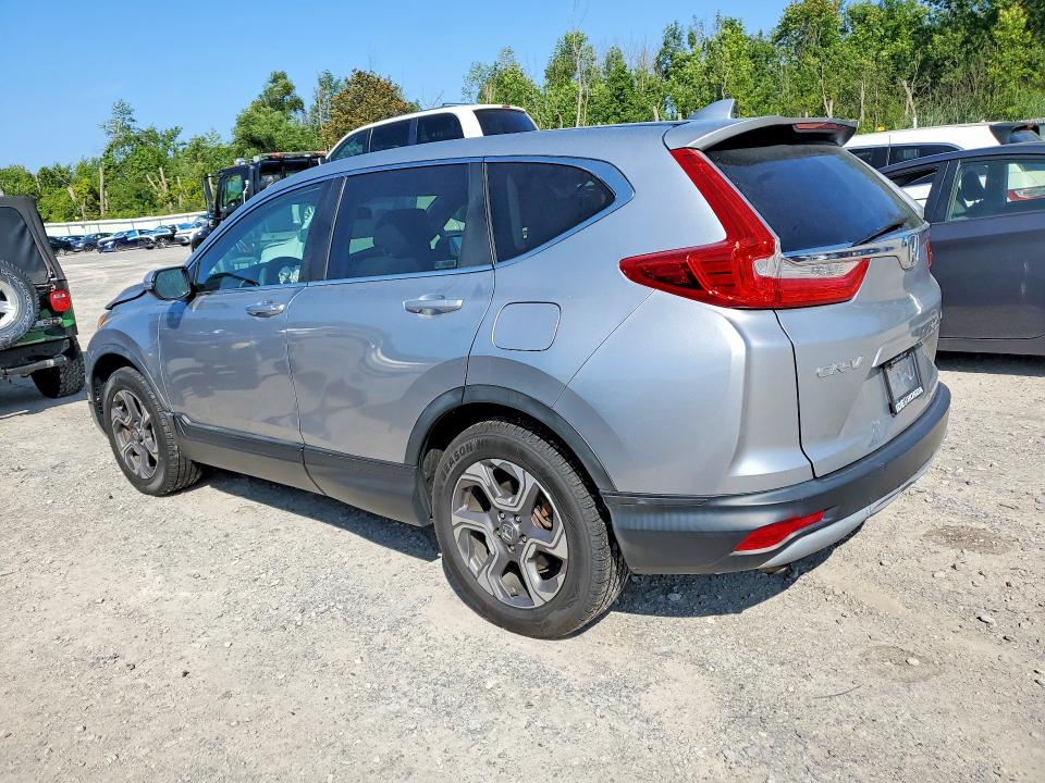 Photo 2 from auction – 2017 HONDA CR-V with VIN 5J6RW2H56HL041528