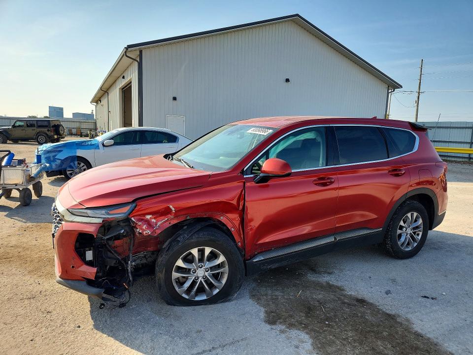 HYUNDAI SANTA FE 2019 with VIN 5NMS3CAD6KH036586 - Photo from auction