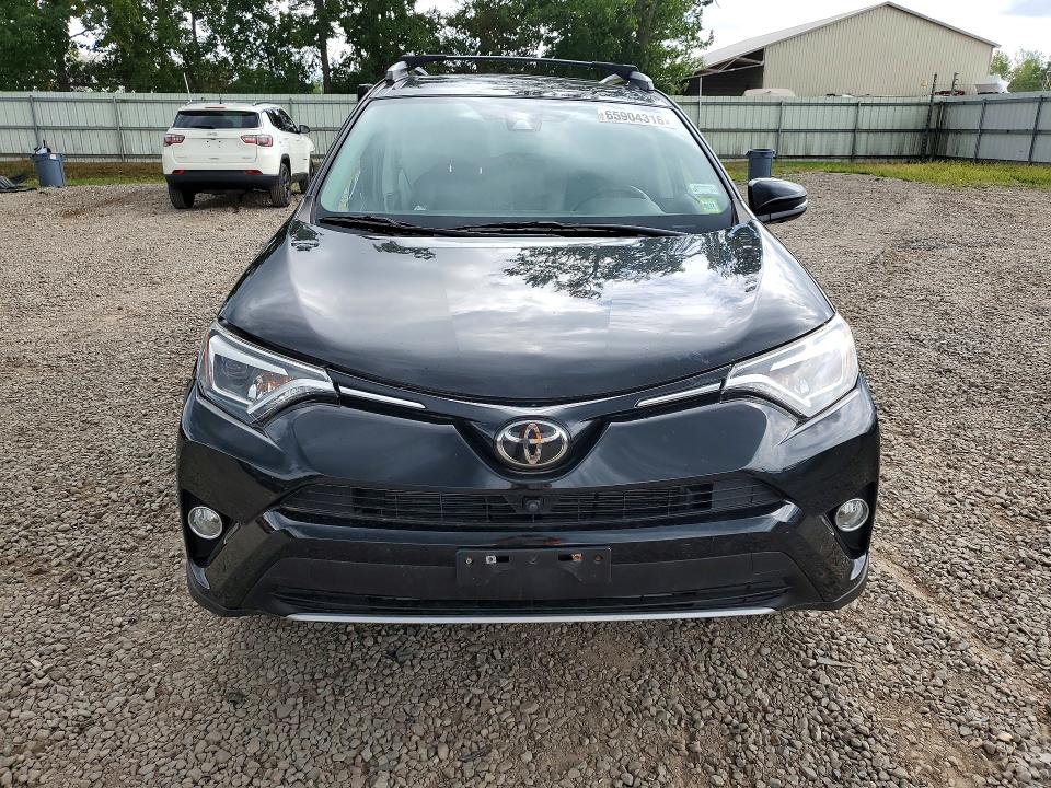Photo 5 from auction – 2016 TOYOTA RAV4 with VIN 2T3DFREV7GW448010