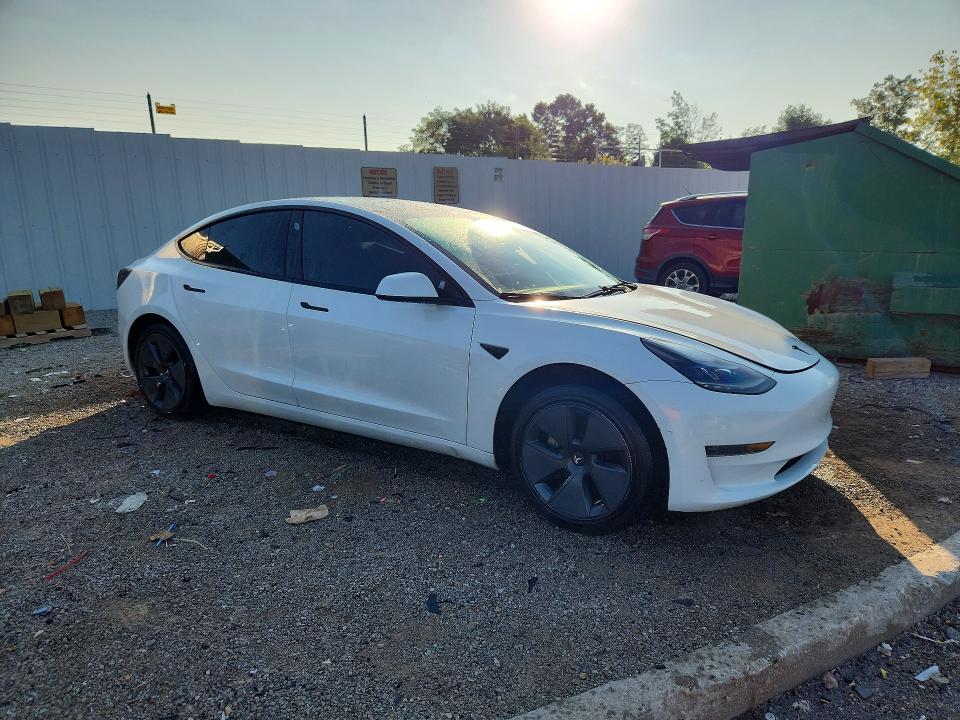 Снимка 4 от търг – 2023 TESLA MODEL 3 с VIN 5YJ3E1EAXPF458405