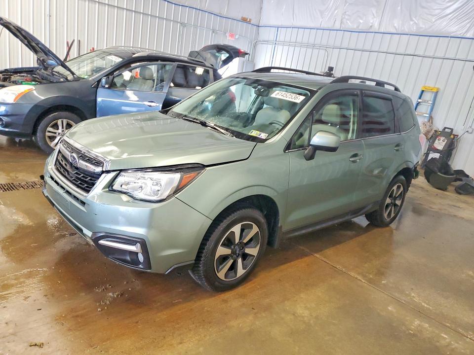 SUBARU FORESTER 2017 with VIN JF2SJAJC3HH401674 - Photo from auction