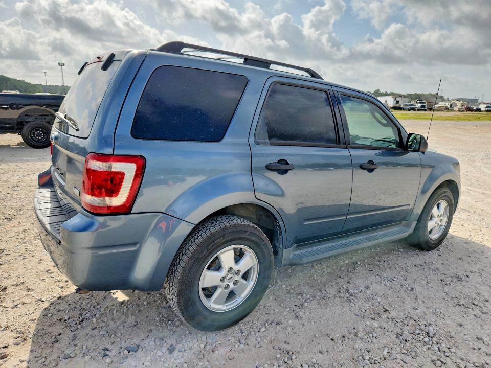 Foto 3 de la subasta – 2011 FORD ESCAPE con VIN 1FMCU0DG9BKB13103