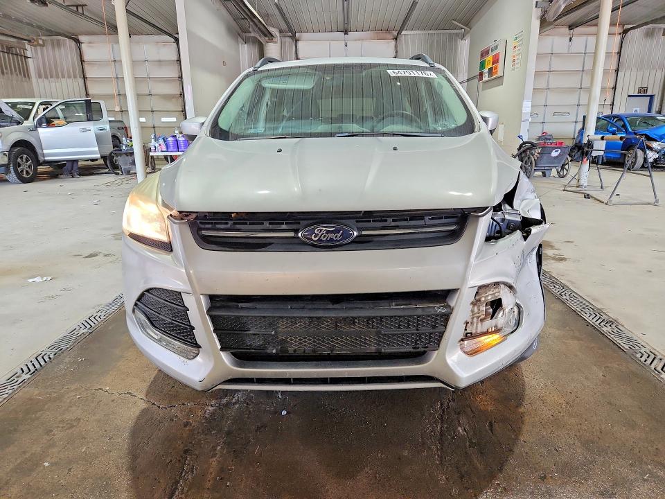 Photo 5 from auction – 2016 FORD ESCAPE with VIN 1FMCU9G97GUA01252