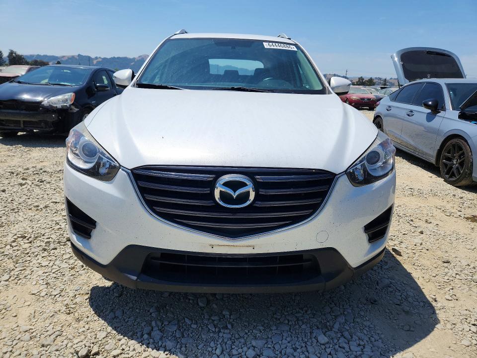 Photo 5 from auction – 2016 MAZDA CX-5 with VIN JM3KE2BY1G0883701