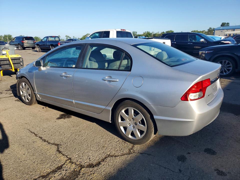 Photo 2 from auction – 2011 HONDA CIVIC with VIN 19XFA1F58BE031104