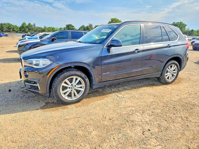 BMW X5 2014 with VIN 5UXKR0C5XE0K44718 - Photo from auction