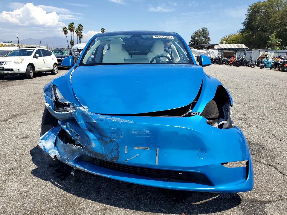 Photo 5 from auction – 2023 TESLA MODEL Y with VIN 7SAYGDEE7PA146935