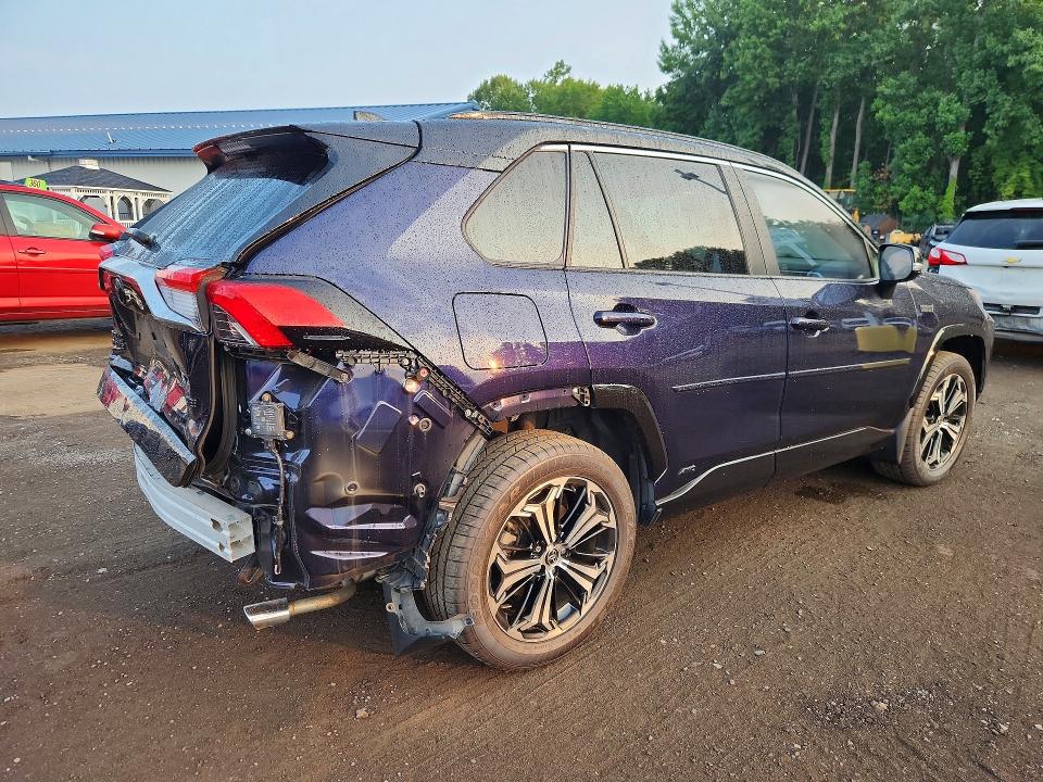 Photo 3 from auction – 2022 TOYOTA RAV4 PRIME with VIN JTMFB3FV4ND093176