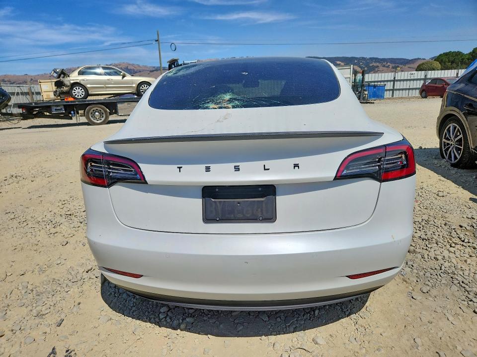 Photo 6 from auction – 2021 TESLA MODEL 3 with VIN 5YJ3E1EC9MF074001