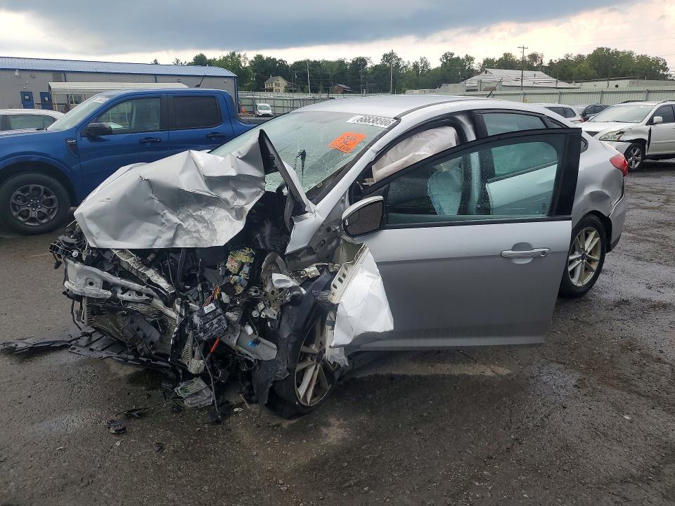 FORD FOCUS 2017 with VIN 1FADP3F24HL201262 - Photo from auction